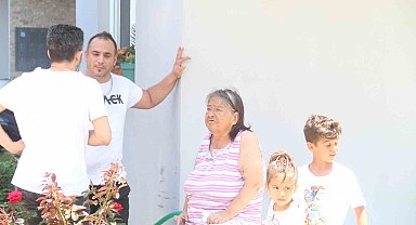 Klimadan çıkan yangında, kayınvalidesiyle kendini son anda dışarı attı