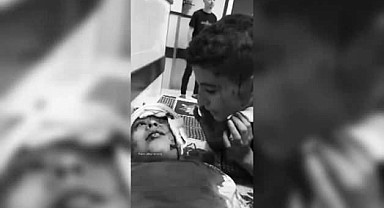 Bu imanı da katletsene İsrail! Sedyede yatan kardeşine Kelime-i Şehadet öğretti!