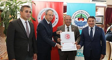 Dilovası muhtarlarına Kaymakam Kubilay'dan başarı belgesi