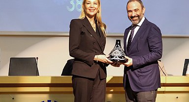 DOSABSİAD'da bayrak Onur Kutlualp'te