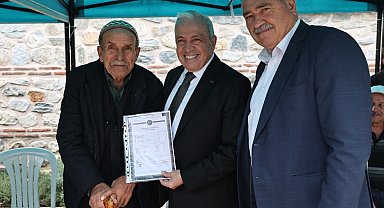 Bursa Ürünlü'de 275 hak sahibine imarlı tapu sevinci