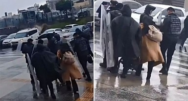 Fırtınada Anne ve Bebeğe Polis Kalkanı